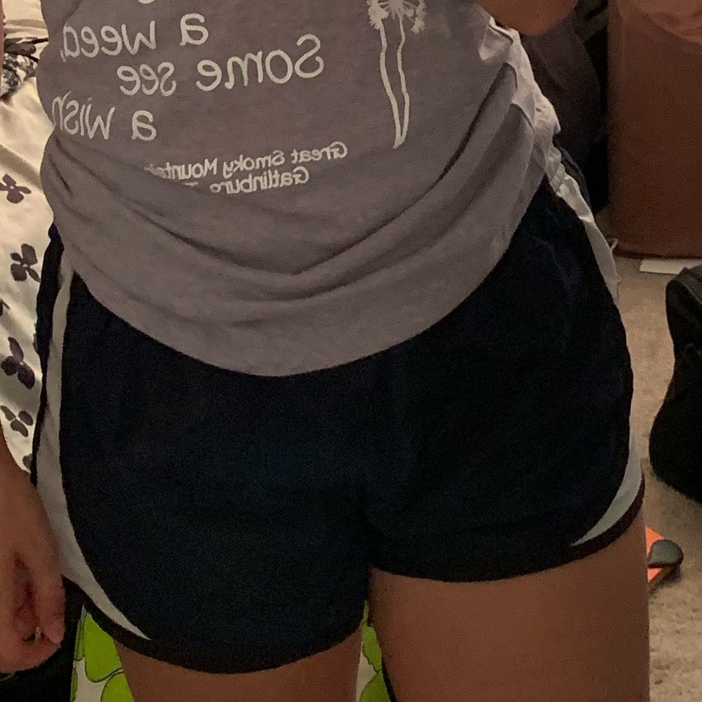 Navy blue and white running shorts size small